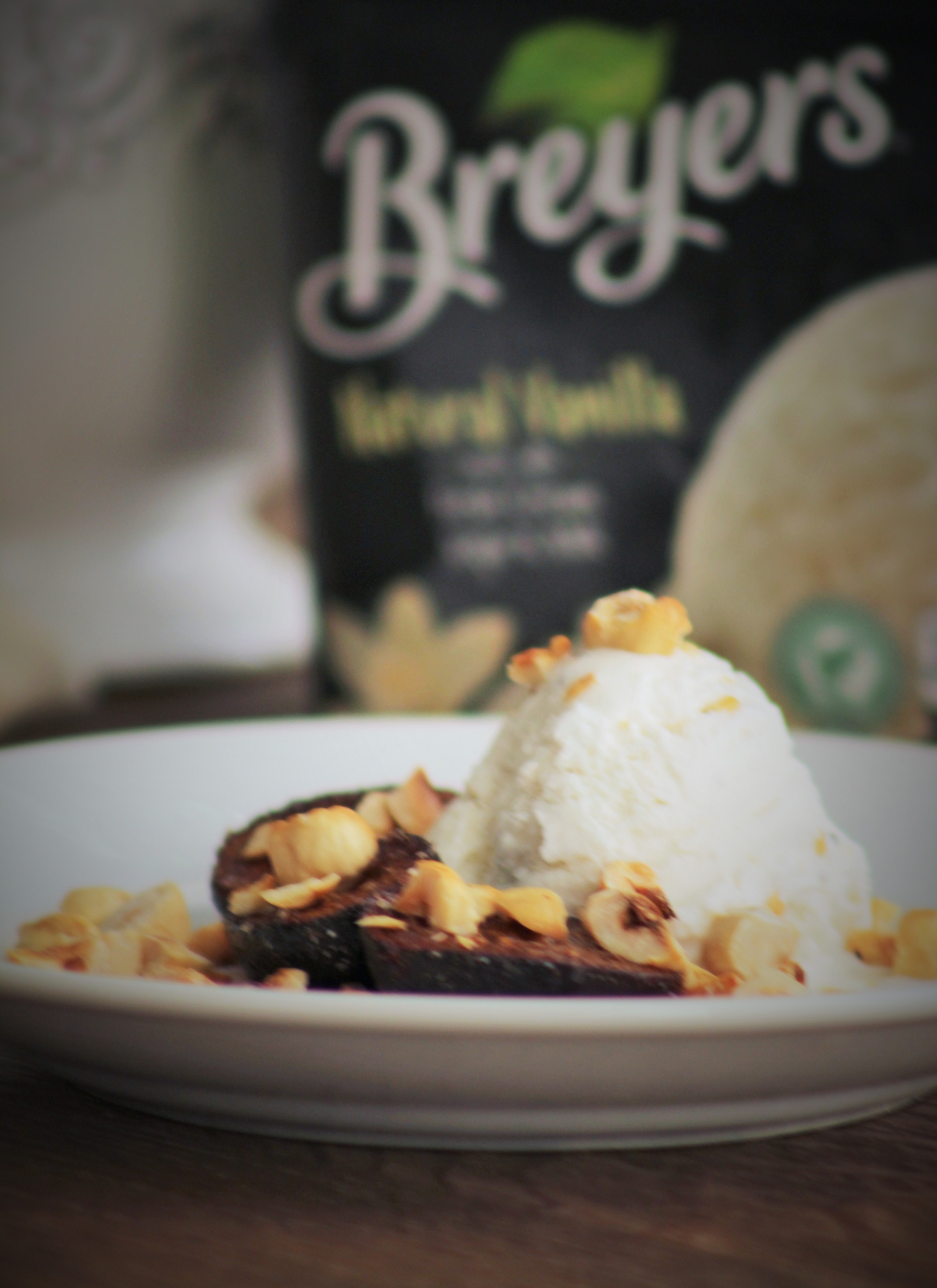 spice roasted figs with hazelnuts and vanilla ice cream